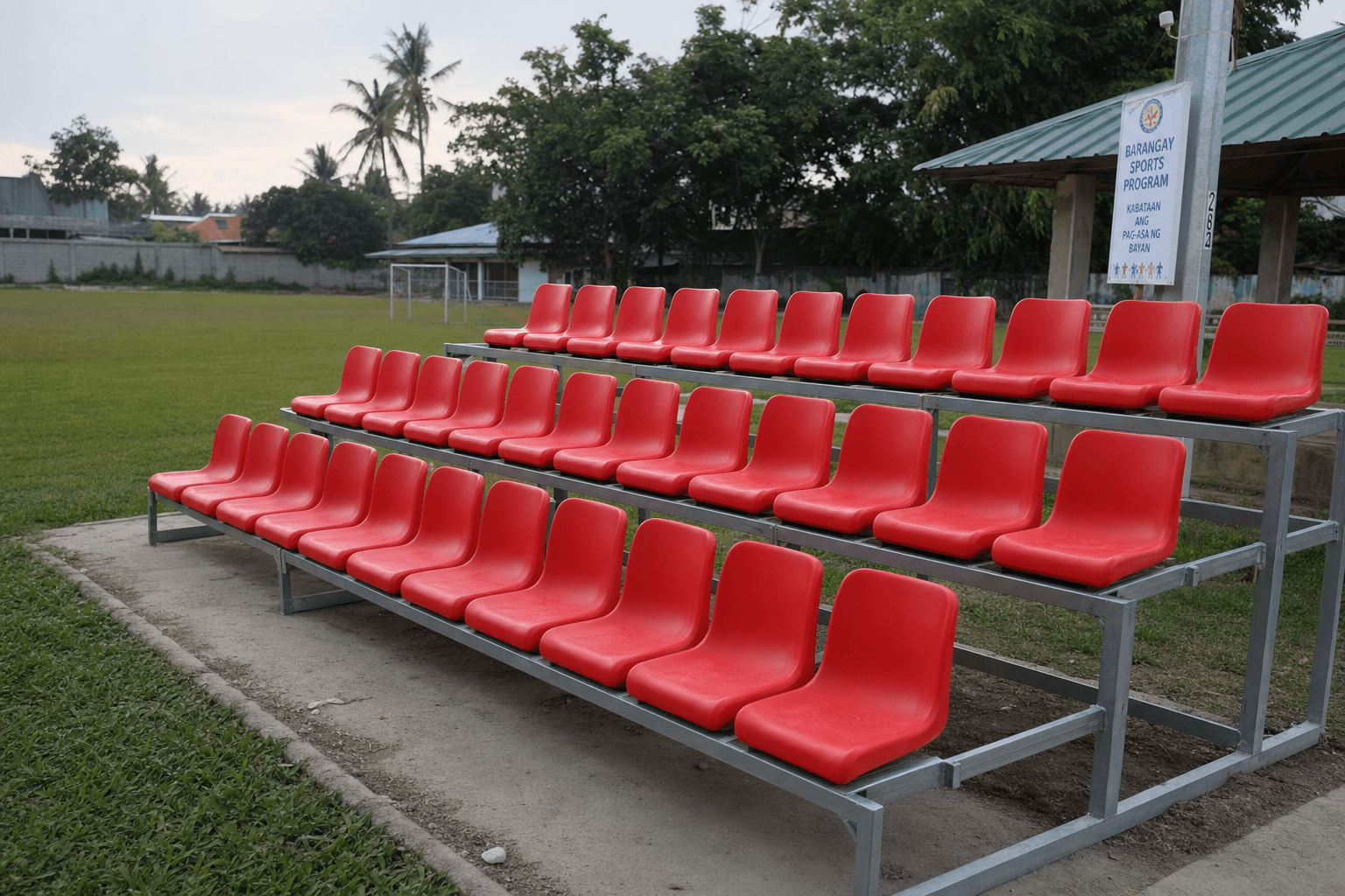 Rainwater draining through perforated stadium seat