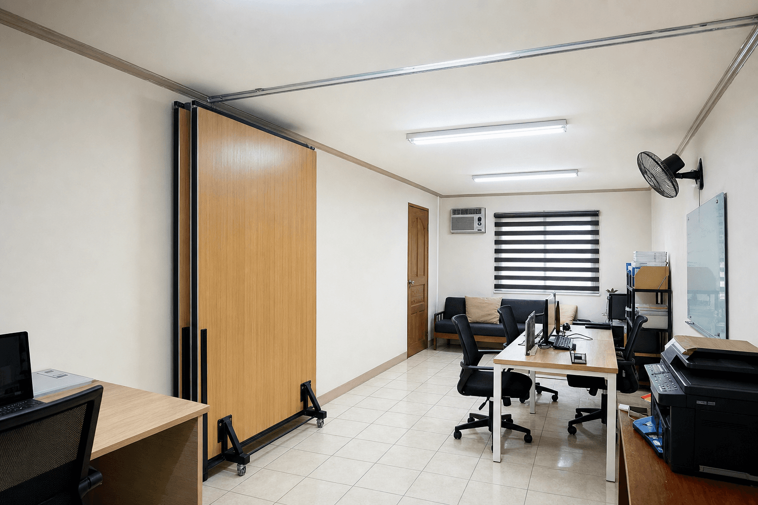 Wide view of a newly installed operable wall stack in an open-plan workspace
